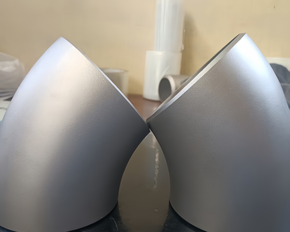 Analysis of Manufacturing Parameters for Titanium Reducing Fittings under ASME B16.9 and ASTM B363 Standards
